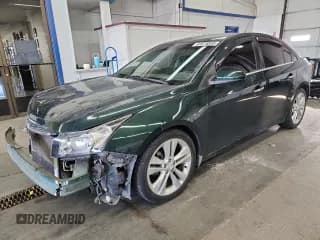 ✅ 2014 Chevrolet Cruze LTZ • VIN: 1G1PG5SB6E7109625 • Lot: 82675855. Listed on Copart with 101,214 mi. Free auction sales archive from the USA and detailed vehicle history report at DreamBid. Image 1.