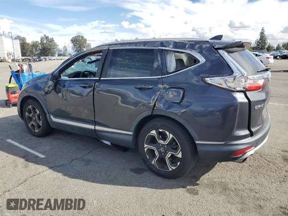✅ 2019 Honda CR-V Touring • VIN: 7FARW1H94KE018864 • Lot: 93495705. Listed on Copart with Not provided. Free auction sales archive from the USA and detailed vehicle history report at DreamBid. Image 2.