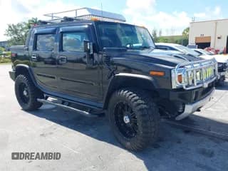 ✅ 2005 Hummer H2 SUT • VIN: 5GRGN22U25H106033 • Lot: 42247892. Wystawiony na IAAI z przebiegiem 120 091 mil. Bezpłatny archiwum sprzedaży aukcyjnych z USA i szczegółowy raport historii pojazdu na DreamBid. Zdjęcie 1.