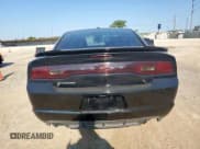 ✅ 2013 Dodge Charger SE • VIN: 2C3CDXBG8DH563355 • Lot: 71091565. Wystawiony na Copart z przebiegiem 123 371 mil. Bezpłatny archiwum sprzedaży aukcyjnych z USA i szczegółowy raport historii pojazdu na DreamBid. Zdjęcie 6.