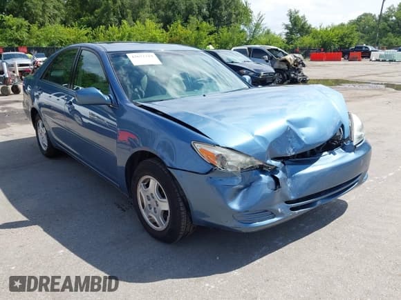 ✅ 2002 Toyota Camry XLE • VIN: 4T1BF32KX2U510628 • Lot: 42672319. Listed on IAAI with 107,608 mi. Free auction sales archive from the USA and detailed vehicle history report at DreamBid. Image 1.