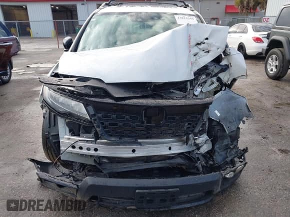 ✅ 2019 Honda Passport Elite • VIN: 5FNYF8H03KB023989 • Lot: 43823344. Listed on IAAI with Not provided. Free auction sales archive from the USA and detailed vehicle history report at DreamBid. Image 6.