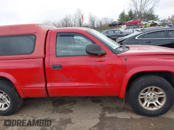 ✅ 2004 Dodge Dakota • VIN: 1D7FL36N04S700154 • Lot: 43770944. Listed on IAAI with 125,998 mi. Free auction sales archive from the USA and detailed vehicle history report at DreamBid. Image 13.