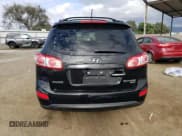 ✅ 2011 Hyundai Santa Fe Limited • VIN: 5XYZK4AG2BG002723 • Lot: 76418934. Listed on Copart with 123,592 mi. Free auction sales archive from the USA and detailed vehicle history report at DreamBid. Image 6.