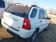 ✅ 2010 Kia Sportage LX • VIN: KNDKGCA35A7701964 • Лот: 41765932. Опубликован ранее на IAAI с пробегом 109 939 миль. Бесплатный доступ к архиву аукционных продаж из США и подробный отчёт об истории автомобиля на DreamBid. Изображение 4.