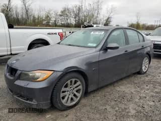 2007 BMW 3 Series 328xi with VIN WBAVC93517KX56490, listed as a Copart auction lot 90311655 with 163,908 mi miles and Salvage title. Bid and sale history available at DreamBid. Image 1.