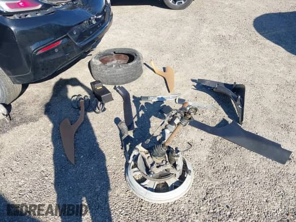 2017 Chevrolet Volt Premier z VIN 1G1RB6S5XHU203648, wystawiony jako IAAI lot #43468353 z przebiegiem Nie podano mil oraz . Historia ofert i sprzedaży dostępna na DreamBid. Obrazek 11.