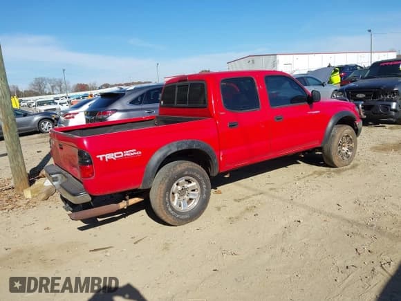 ✅ 2001 Toyota Tacoma PreRunner • VIN: 5TEGN92N21Z772434 • Lot: 43725357. Listed on IAAI with 344,649 mi. Free auction sales archive from the USA and detailed vehicle history report at DreamBid. Image 4.