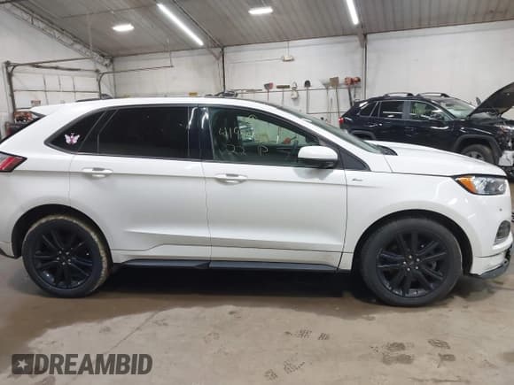 ✅ 2022 Ford Edge SEL • VIN: 2FMPK4J96NBA59780 • Lot: 41940804. Wystawiony na IAAI z przebiegiem 77 325 mil. Bezpłatny archiwum sprzedaży aukcyjnych z USA i szczegółowy raport historii pojazdu na DreamBid. Zdjęcie 13.
