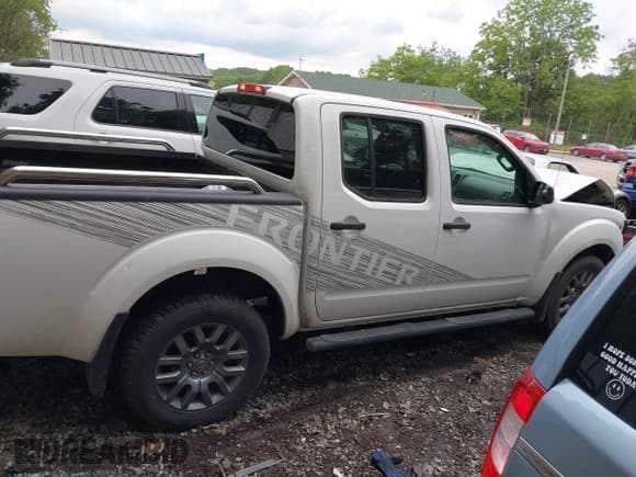 ✅ 2012 Nissan Frontier Pro-4X • VIN: 1N6AD0EV7CC409206 • Lot: 42388170. Listed on IAAI with 126,411 mi. Free auction sales archive from the USA and detailed vehicle history report at DreamBid. Image 13.