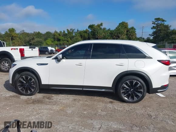 ✅ 2024 Mazda CX-90 Premium Plus • VIN: JM3KKEHAXR1118570 • Lot: 43572848. Listed on IAAI with 26,937 mi. Free auction sales archive from the USA and detailed vehicle history report at DreamBid. Image 14.