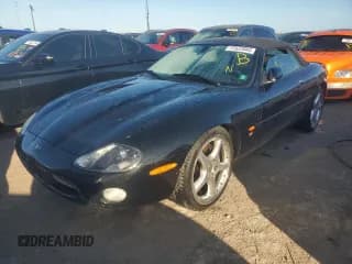 ✅ 2003 Jaguar XK • VIN: SAJDA42B533A31692 • Лот: 77537044. Опубликован ранее на Copart с пробегом 61 226 миль. Бесплатный доступ к архиву аукционных продаж из США и подробный отчёт об истории автомобиля на DreamBid. Изображение 1.
