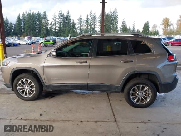 ✅ 2019 Jeep Cherokee Latitude Plus • VIN: 1C4PJMLXXKD394260 • Lot: 43667606. Listed on IAAI with 91,794 mi. Free auction sales archive from the USA and detailed vehicle history report at DreamBid. Image 15.