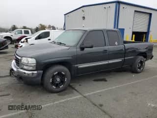 2004 GMC Sierra 1500 SLE with VIN 2GTEC19V341109483, listed as a Copart auction lot 90257985 with 395,356 mi miles and Salvage title. Bid and sale history available at DreamBid. Image 1.