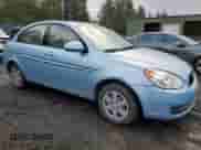 2006 Hyundai Accent GLS with VIN KMHCN46C56U004971, listed as a Copart auction lot 77301034 with 229,170 mi miles and Salvage title. Bid and sale history available at DreamBid. Image 4.