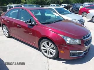✅ 2015 Chevrolet Cruze LTZ • VIN: 1G1PG5SB5F7279010 • Lot: 42381645. Listed on IAAI with 174,725 mi. Free auction sales archive from the USA and detailed vehicle history report at DreamBid. Image 1.