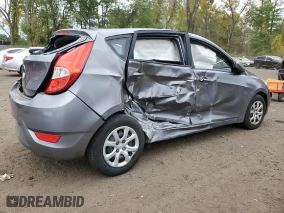 ✅ 2014 Hyundai Accent GS • VIN: KMHCT5AE7EU142546 • Лот: 72621934. Опубликован ранее на Copart с пробегом 130 004 миль. Бесплатный доступ к архиву аукционных продаж из США и подробный отчёт об истории автомобиля на DreamBid. Изображение 3.