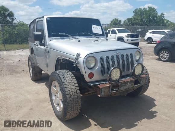 ✅ 2009 Jeep Wrangler X • VIN: 1J4FA24189L755392 • Lot: 42176130. Wystawiony na IAAI z przebiegiem 97 644 mil. Bezpłatny archiwum sprzedaży aukcyjnych z USA i szczegółowy raport historii pojazdu na DreamBid. Zdjęcie 1.