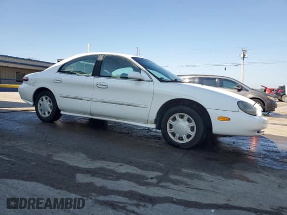 ✅ 1998 Mercury Sable GS • VIN: 1MEFM50U7WA630128 • Lot: 81300445. Listed on Copart with 77,862 mi. Free auction sales archive from the USA and detailed vehicle history report at DreamBid. Image 4.