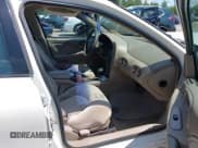 ✅ 2004 Pontiac Bonneville SE • VIN: 1G2HX52K14U176018 • Lot: 42691668. Wystawiony na IAAI z przebiegiem 185 274 mil. Bezpłatny archiwum sprzedaży aukcyjnych z USA i szczegółowy raport historii pojazdu na DreamBid. Zdjęcie 5.