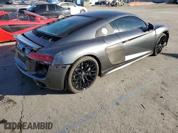 ✅ 2017 Audi R8 performance quattro • VIN: WUAKBAFX6H7903367 • Lot: 83113234. Listed on Copart with 14,352 mi. Free auction sales archive from the USA and detailed vehicle history report at DreamBid. Image 3.
