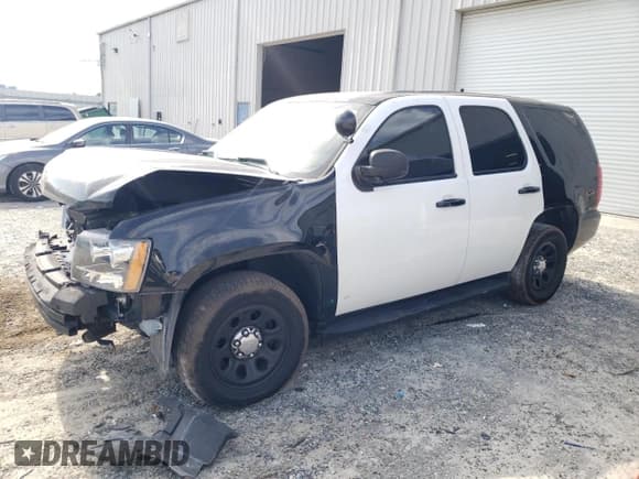 ✅ 2011 Chevrolet Tahoe Commercial • VIN: 1GNLC2E0XBR344000 • Lot: 62489915. Listed on Copart with 114,364 mi. Free auction sales archive from the USA and detailed vehicle history report at DreamBid. Image 1.