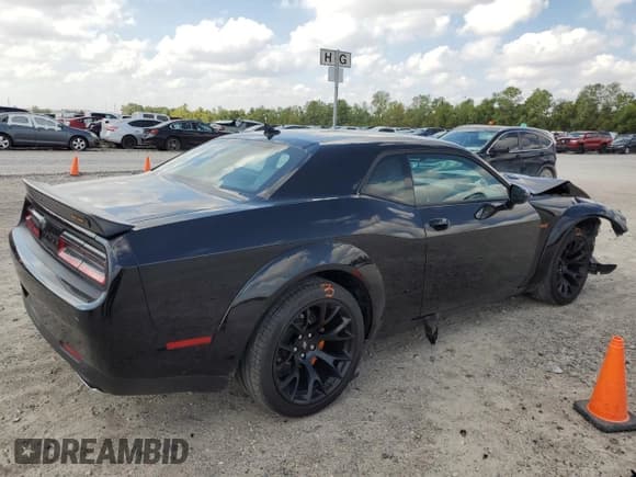 ✅ 2022 Dodge Challenger R/T Scat Pack Widebody • VIN: 2C3CDZFJ7NH122528 • Lot: 67906613. Listed on Copart with 12,809 mi. Free auction sales archive from the USA and detailed vehicle history report at DreamBid. Image 3.