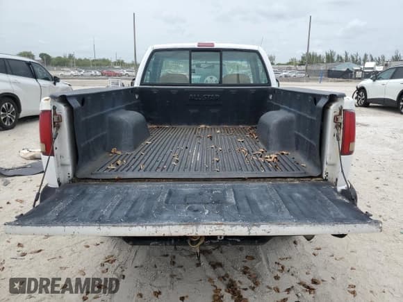 ✅ 1997 Chevrolet S-10 • VIN: 1GCCS14X2V8184581 • Лот: 59820885. Опубликован ранее на Copart с пробегом 205 233 миль. Бесплатный доступ к архиву аукционных продаж из США и подробный отчёт об истории автомобиля на DreamBid. Изображение 6.