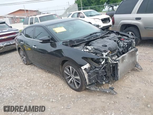 ✅ 2019 Nissan Maxima Platinum • VIN: 1N4AA6AV6KC360167 • Lot: 42465839. Wystawiony na IAAI z przebiegiem 102 481 mil. Bezpłatny archiwum sprzedaży aukcyjnych z USA i szczegółowy raport historii pojazdu na DreamBid. Zdjęcie 1.