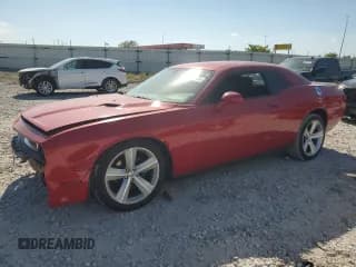 ✅ 2012 Dodge Challenger SXT • VIN: 2C3CDYAGXCH176831 • Lot: 70942105. Wystawiony na Copart z przebiegiem 156 131 mil. Bezpłatny archiwum sprzedaży aukcyjnych z USA i szczegółowy raport historii pojazdu na DreamBid. Zdjęcie 1.
