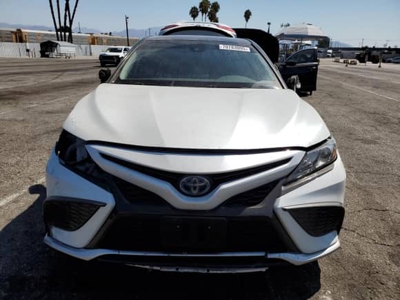 2021 Toyota Camry Hybrid XSE с VIN 4T1K31AK4MU023460, выставлен на аукционе Copart как лот 70783095 с пробегом 93 200 миль миль и Списание • Salvage title. История ставок и продаж доступна на DreamBid. Изображение 5.