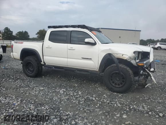 ✅ 2021 Toyota Tacoma TRD Off Road • VIN: 3TMCZ5AN1MM432190 • Лот: 84175875. Опубликован ранее на Copart с пробегом 68 818 миль. Бесплатный доступ к архиву аукционных продаж из США и подробный отчёт об истории автомобиля на DreamBid. Изображение 4.