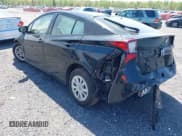 ✅ 2021 Toyota Prius L Eco • VIN: JTDKAMFU6M3150237 • Lot: 42085038. Listed on IAAI with 86,175 mi. Free auction sales archive from the USA and detailed vehicle history report at DreamBid. Image 3.