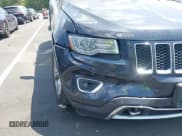 ✅ 2014 Jeep Grand Cherokee Overland • VIN: 1C4RJFCM0EC367556 • Lot: 43071781. Listed on IAAI with 218,589 mi. Free auction sales archive from the USA and detailed vehicle history report at DreamBid. Image 12.