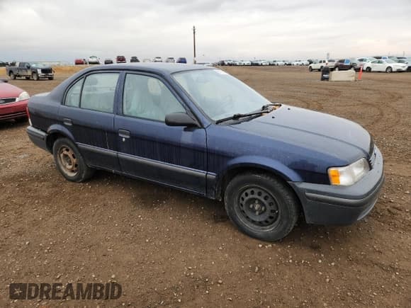 ✅ 1999 Toyota Tercel • VIN: JT2BC53LXX0366733 • Lot: 93113075. Listed on Copart with 163,435 mi. Free auction sales archive from the USA and detailed vehicle history report at DreamBid. Image 4.