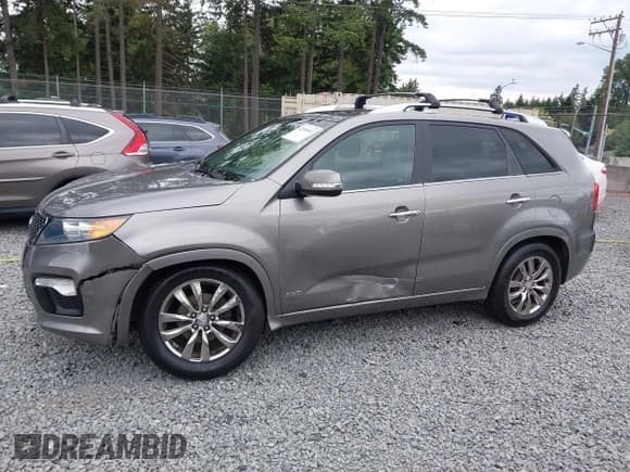 ✅ 2012 Kia Sorento SX • VIN: 5XYKWDA28CG281834 • Lot: 42596832. Listed on IAAI with 140,233 mi. Free auction sales archive from the USA and detailed vehicle history report at DreamBid. Image 14.