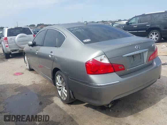 ✅ 2010 Infiniti M • VIN: JN1CY0AP2AM910957 • Lot: 41530001. Listed on IAAI with 152,849 mi. Free auction sales archive from the USA and detailed vehicle history report at DreamBid. Image 3.