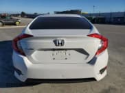 ✅ 2018 Honda Civic LX • VIN: 19XFC2F51JE202855 • Лот: 91293445. Опубликован ранее на Copart с пробегом 56 359 миль. Бесплатный доступ к архиву аукционных продаж из США и подробный отчёт об истории автомобиля на DreamBid. Изображение 6.