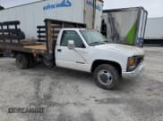 ✅ 1999 GMC Sierra 1500 • VIN: 1GDJC34R3XF087014 • Lot: 86367084. Wystawiony na Copart z przebiegiem 94 539 mil. Bezpłatny archiwum sprzedaży aukcyjnych z USA i szczegółowy raport historii pojazdu na DreamBid. Zdjęcie 4.