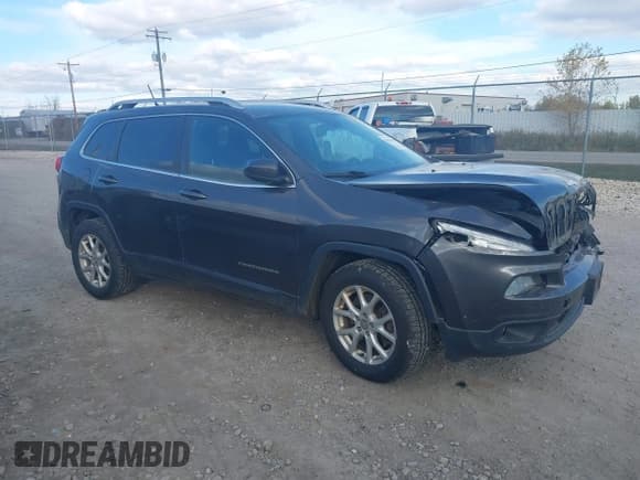 ✅ 2015 Jeep Cherokee Latitude • VIN: 1C4PJMCS6FW528292 • Lot: 43561483. Listed on IAAI with 136,416 mi. Free auction sales archive from the USA and detailed vehicle history report at DreamBid. Image 1.