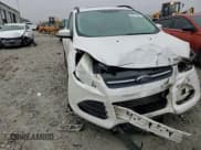 ✅ 2015 Ford Escape SE • VIN: 1FMCU0G97FUC40987 • Lot: 90411325. Listed on Copart with 130,031 mi. Free auction sales archive from the USA and detailed vehicle history report at DreamBid. Image 15.