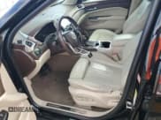 ✅ 2014 Cadillac SRX Premium Collection • VIN: 3GYFNDE31ES586983 • Lot: 86104535. Wystawiony na Copart z przebiegiem 147 446 mil. Bezpłatny archiwum sprzedaży aukcyjnych z USA i szczegółowy raport historii pojazdu na DreamBid. Zdjęcie 7.