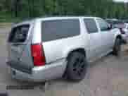 2014 Chevrolet Suburban LT z VIN 1GNSCJE0XER203597, wystawiony jako IAAI lot #42215407 z przebiegiem 186 556 mil mil oraz . Historia ofert i sprzedaży dostępna na DreamBid. Obrazek 4.