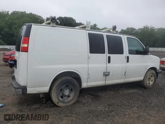 ✅ 2014 Chevrolet Express Cargo • VIN: 1GCWGFCG2E1183226 • Lot: 67111245. Listed on Copart with 181,401 mi. Free auction sales archive from the USA and detailed vehicle history report at DreamBid. Image 3.