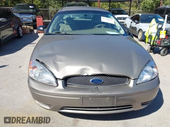 ✅ 2006 Ford Taurus SE • VIN: 1FAFP53U66A110531 • Lot: 43498915. Wystawiony na IAAI z przebiegiem 174 653 mil. Bezpłatny archiwum sprzedaży aukcyjnych z USA i szczegółowy raport historii pojazdu na DreamBid. Zdjęcie 6.