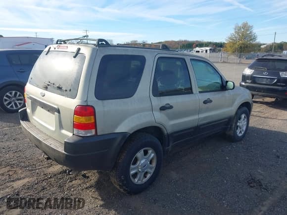 ✅ 2003 Ford Escape XLT Popular 2 • VIN: 1FMYU93173KC66300 • Лот: 43618754. Опубликован ранее на IAAI с пробегом 194 762 миль. Бесплатный доступ к архиву аукционных продаж из США и подробный отчёт об истории автомобиля на DreamBid. Изображение 4.