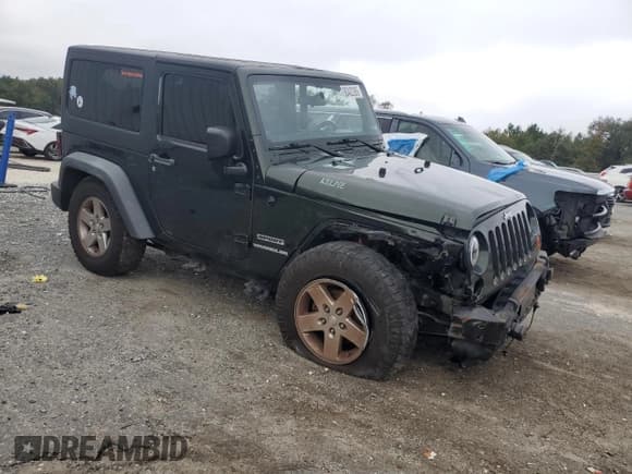 ✅ 2011 Jeep Wrangler Sport • VIN: 1J4AA2D14BL586035 • Lot: 90402395. Listed on Copart with 99,636 mi. Free auction sales archive from the USA and detailed vehicle history report at DreamBid. Image 4.
