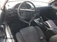 ✅ 1993 Mazda MX-5 Miata • VIN: JM1NA3510P1410243 • Lot: 68921295. Wystawiony na Copart z przebiegiem 74 843 mil. Bezpłatny archiwum sprzedaży aukcyjnych z USA i szczegółowy raport historii pojazdu na DreamBid. Zdjęcie 8.