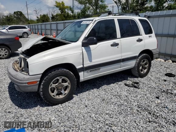 ✅ 1999 Chevrolet Tracker • VIN: 2CNBJ13CXX6914447 • Лот: 64100275. Опубликован ранее на Copart с пробегом 245 410 миль. Бесплатный доступ к архиву аукционных продаж из США и подробный отчёт об истории автомобиля на DreamBid. Изображение 1.