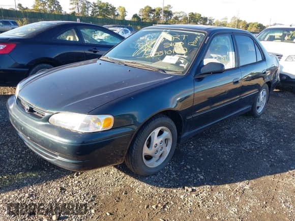 ✅ 1999 Toyota Corolla VE • VIN: 2T1BR12E5XC127162 • Lot: 43412708. Listed on IAAI with Not provided. Free auction sales archive from the USA and detailed vehicle history report at DreamBid. Image 2.
